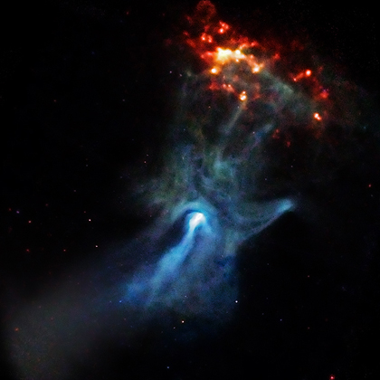 Telescope picture of space with a blue nebula-like star cloud that looks like a hand reaching for a orange-red oval shaped star cloud